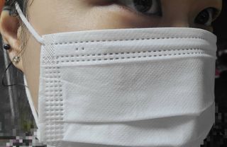 위케어 원데이 덴탈마스크 50매 화이트 대형 국내생산 — 5점을 준 리뷰어가 2021년 2월 올린 사용 사진