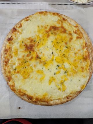 [푸딩팩토리] 10인치 씬피자 3종 택2_베샤멜 고르곤졸라/불고기/고르곤졸라 — 5점을 준 리뷰어가 2022년 5월 올린 사용 사진