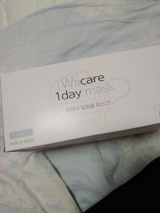 위케어 원데이 덴탈마스크 50매 화이트 대형 국내생산 — 5점을 준 리뷰어가 2021년 2월 올린 사용 사진