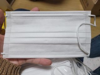 위케어 원데이 덴탈마스크 50매 화이트 대형 국내생산 — 5점을 준 리뷰어가 2021년 2월 올린 사용 사진