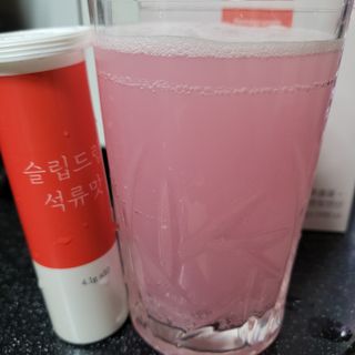 [슬림드랍 석류맛] 건기식 다이어트 보조제 겸 비타민 — 3.5점을 준 리뷰어가 2022년 2월 올린 사용 사진