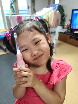[오라덴스] 99.9 항균 칫솔모_키즈 진동칫솔 2,3단계 중 택 1 — 5점을 준 리뷰어가 2021년 7월 올린 사용 사진