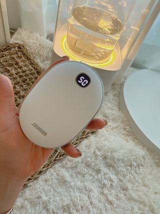 썬더월드 [썬더] 스마트 핸드워머 충전식 손난로 보조배터리 10000mAh — 5점을 준 리뷰어가 2024년 12월 올린 사용 사진