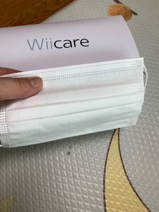 위케어 원데이 덴탈마스크 50매 화이트 대형 국내생산 — 4.5점을 준 리뷰어가 2021년 2월 올린 사용 사진