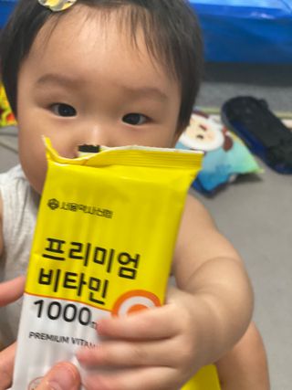 서울약사신협 프리미엄 비타민C 1,000mg_2.5g x 50포 — 5점을 준 리뷰어가 2021년 10월 올린 사용 사진