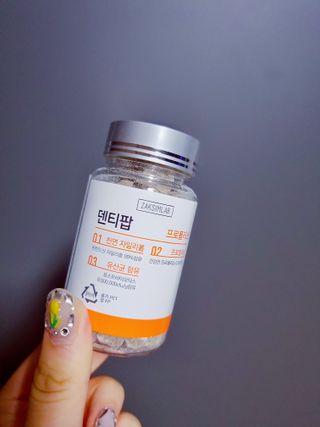작심연구소 구취제거+충치예방+치아화이트닝 마법의 캔디 덴티팝3종(맛 랜덤 발송) — 4.5점을 준 리뷰어가 2022년 6월 올린 사용 사진