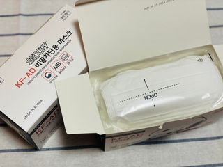 JHWORLD 스누피 마스크 정품 스누피 KF-AD 국내 비말차단 아동용 성인용 일회용 덴탈마스크 50매 — 5점을 준 리뷰어가 2021년 6월 올린 사용 사진