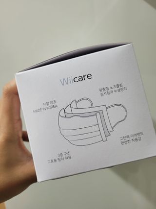 위케어 원데이 덴탈마스크 50매 화이트 대형 국내생산 — 5점을 준 리뷰어가 2021년 2월 올린 사용 사진