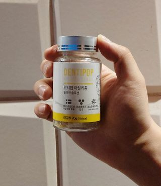 작심연구소 구취제거+충치예방+치아화이트닝 마법의 캔디 덴티팝3종(맛 랜덤 발송) — 5점을 준 리뷰어가 2022년 5월 올린 사용 사진
