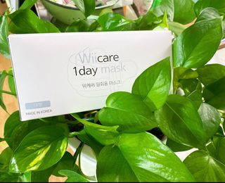 위케어 원데이 덴탈마스크 50매 화이트 대형 국내생산 — 5점을 준 리뷰어가 2021년 2월 올린 사용 사진