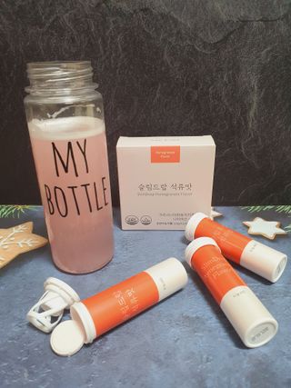 [슬림드랍 석류맛] 건기식 다이어트 보조제 겸 비타민 — 5점을 준 리뷰어가 2022년 3월 올린 사용 사진