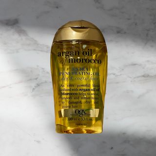 0.8L OGX 엑스트라 스트렝스 리뉴잉 + 아르간 오일 오브 모로코 페트레이팅 헤어 오일 트리트먼트 — 5점을 준 리뷰어가 2022년 3월 올린 사용 사진