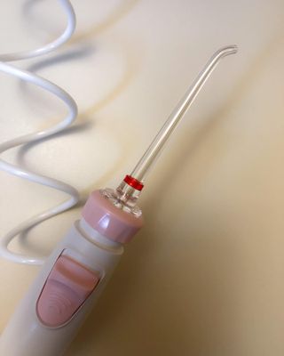 Aquapick AQ-350 물 Flosser 전기 치과 수조 치아 용 전문 구강 세정기 — 4.5점을 준 리뷰어가 2022년 4월 올린 사용 사진