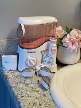 Aquapick AQ-350 물 Flosser 전기 치과 수조 치아 용 전문 구강 세정기 — 5점을 준 리뷰어가 2022년 4월 올린 사용 사진