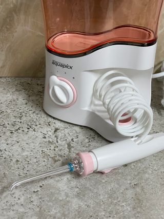 Aquapick AQ-350 물 Flosser 전기 치과 수조 치아 용 전문 구강 세정기 — 5점을 준 리뷰어가 2022년 5월 올린 사용 사진
