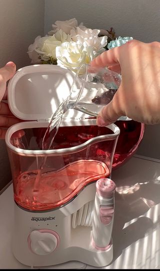 Aquapick AQ-350 물 Flosser 전기 치과 수조 치아 용 전문 구강 세정기 — 5점을 준 리뷰어가 2022년 4월 올린 사용 사진
