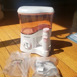 Aquapick AQ-350 물 Flosser 전기 치과 수조 치아 용 전문 구강 세정기 — 4점을 준 리뷰어가 2022년 4월 올린 사용 사진