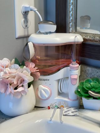 Aquapick AQ-350 물 Flosser 전기 치과 수조 치아 용 전문 구강 세정기 — 5점을 준 리뷰어가 2022년 4월 올린 사용 사진